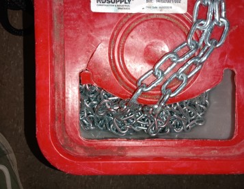 3/16th  chain Non Galvanized .80 cents per foot - A whole bucket of it.